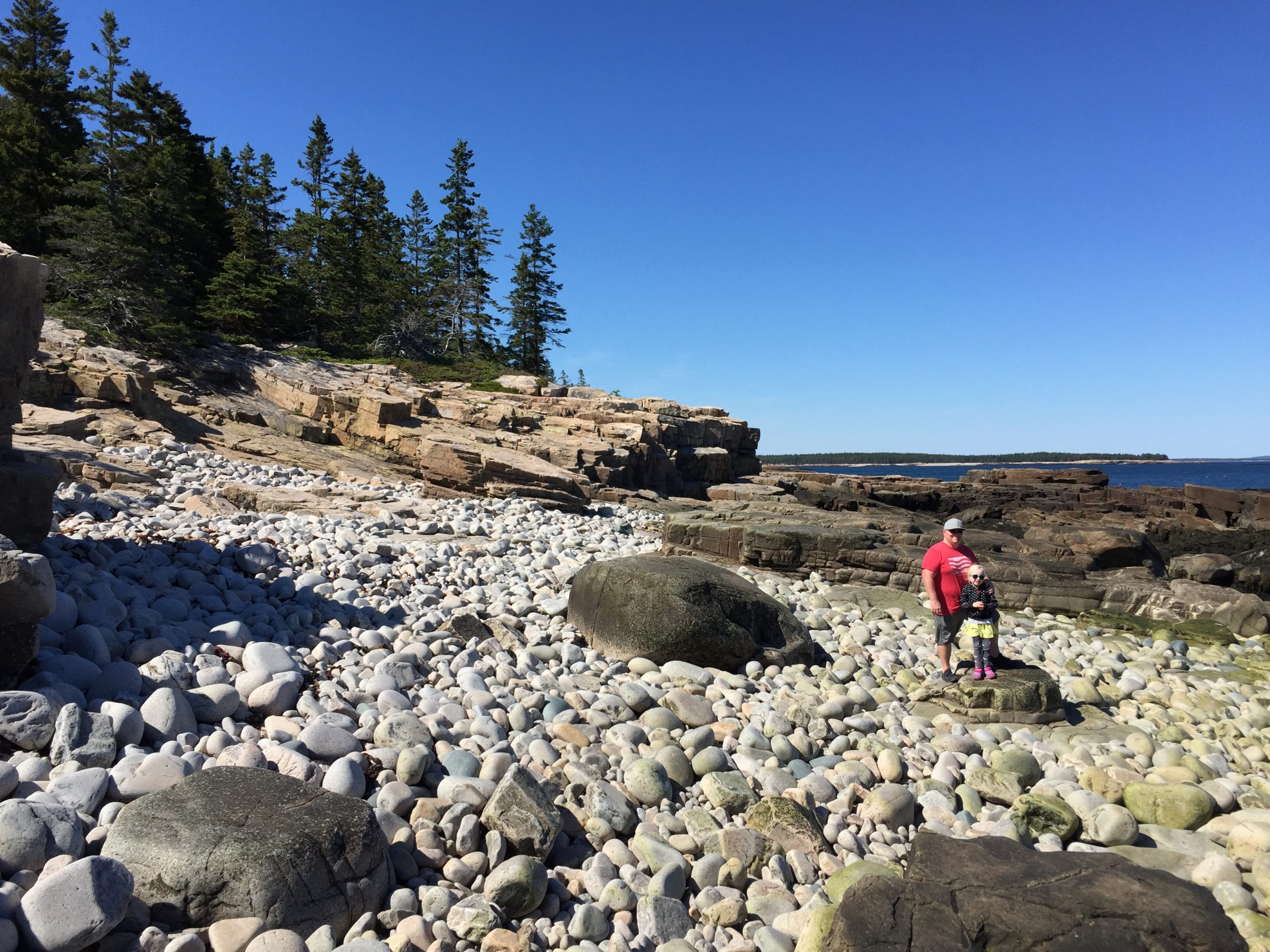 Man And Girl Standing On Ocean Rocks Schoodic Peninsula Things To Do