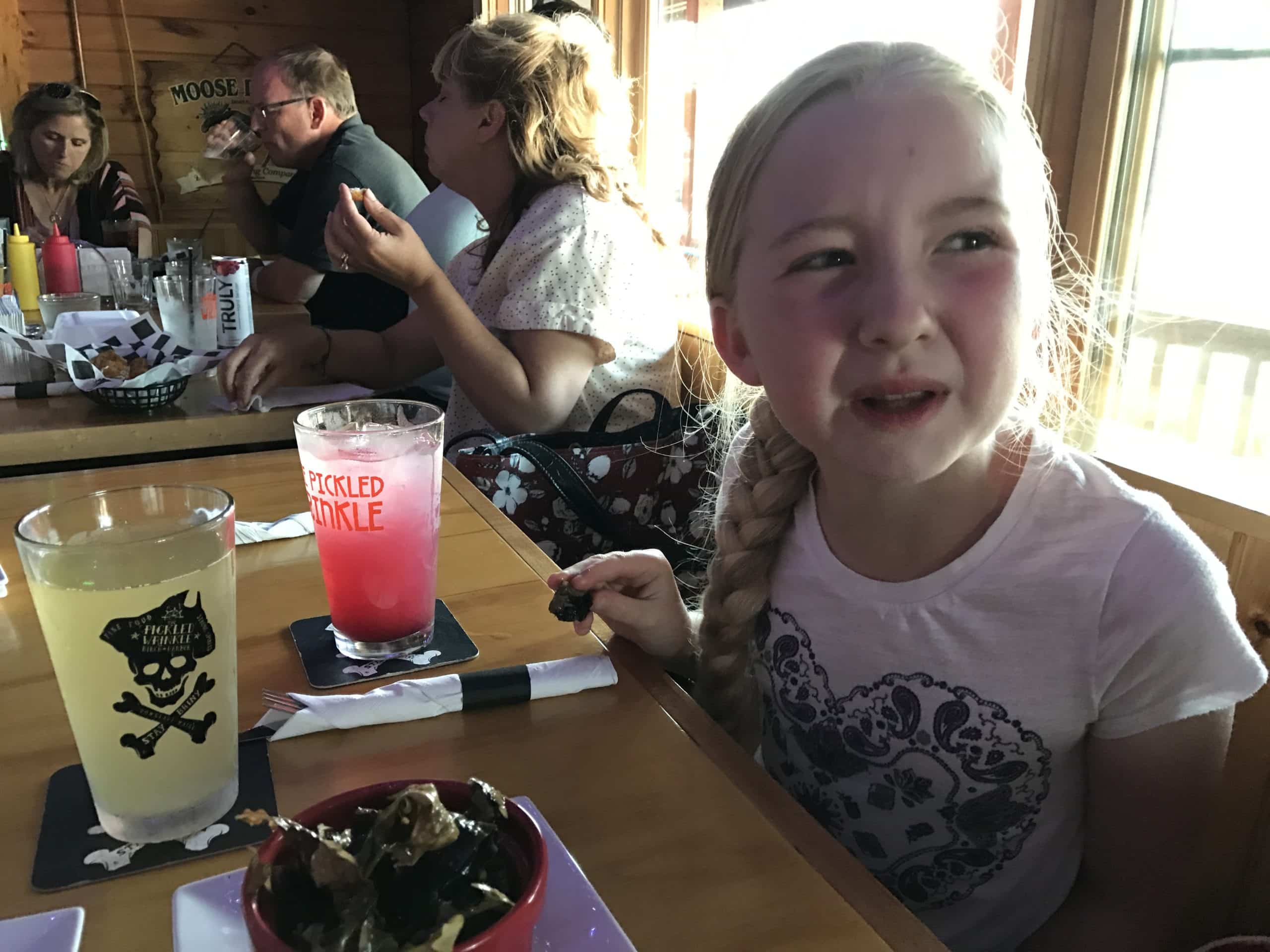 Girl Making A Funny Face After Trying Sea Dulce In A Restaurant Acadia National Park Park
