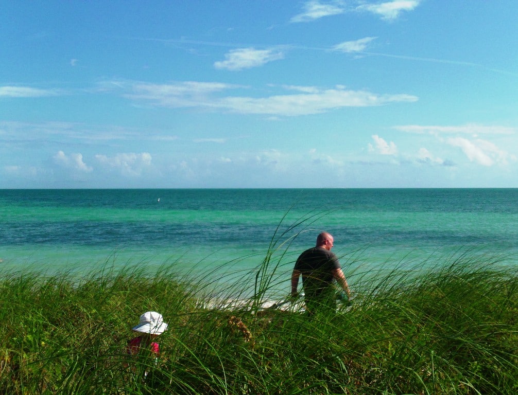 Man and Girl On The Beach In The Florida Keys Warmest National Parks To Visit In Winter