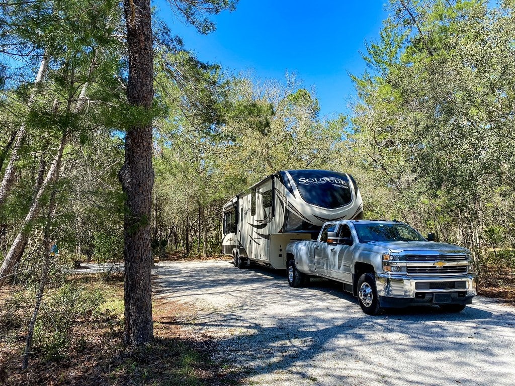 RV In Wooded Campsite Tips Living In An RV Full Time