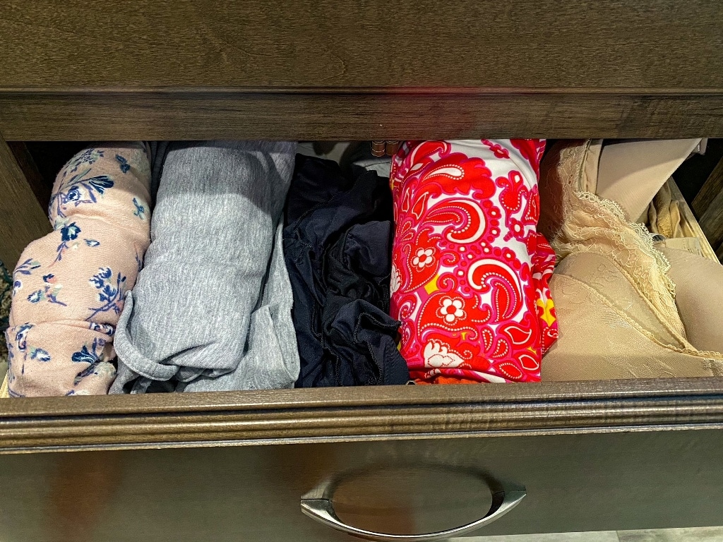Rolled Clothes In RV Drawer - Best Camping Clothes For RV Living