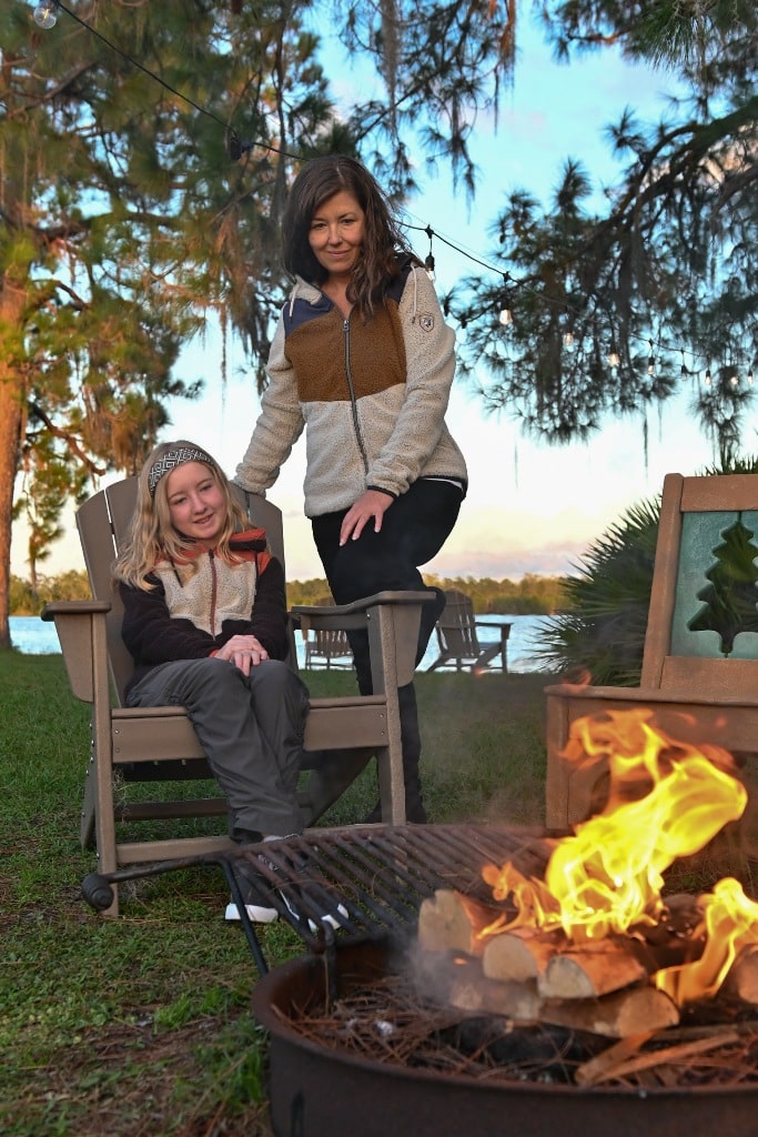 Girl And Mom At A Campfire - Best Camping Clothes For RV Living