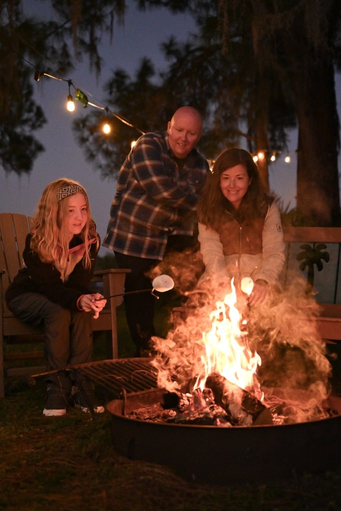 Family roasting marshmallows - Full-Time RV Living and Travel