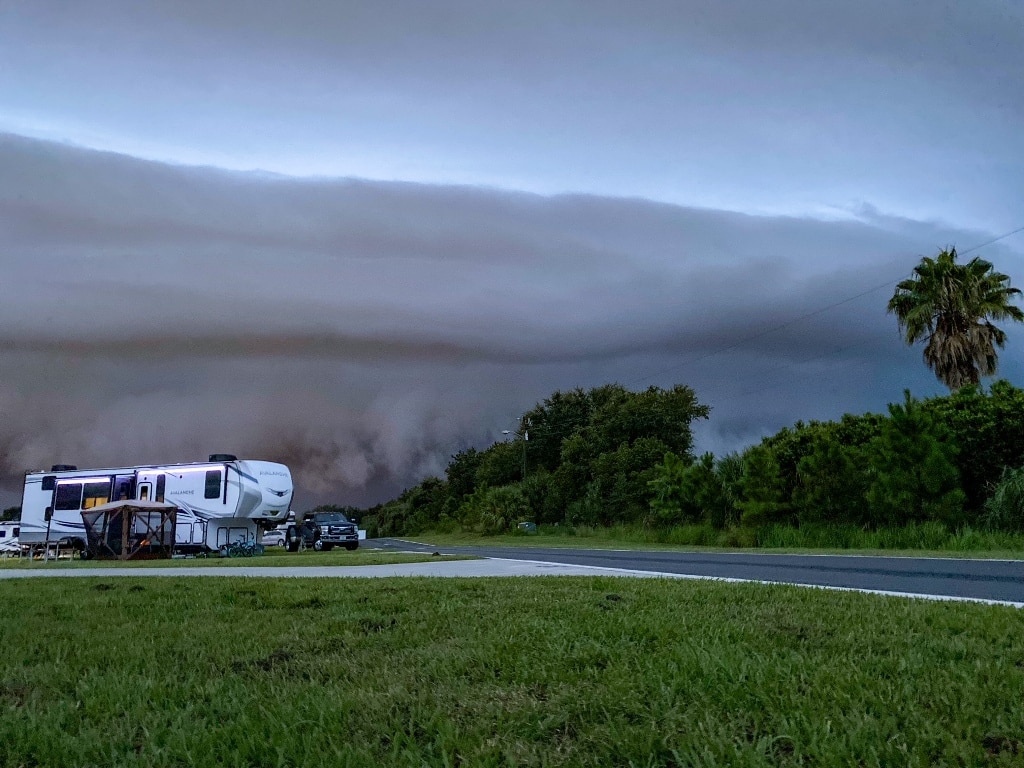RV With Storm Clouds - Full-Time RV Living and Travel