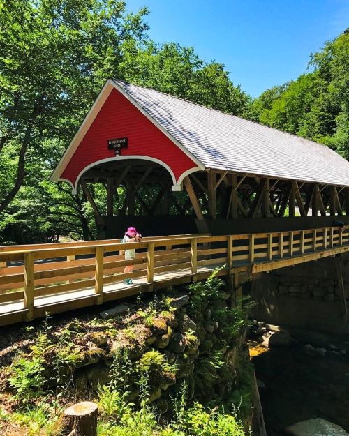 Girl on covered bridge in New Hampshire - full-time RV living safety